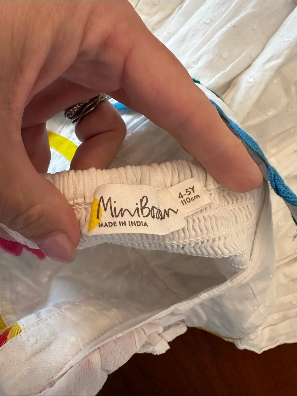 Mini Boden White Pinafore jumper with Rainbow Ric-Rac Trim size 4-5